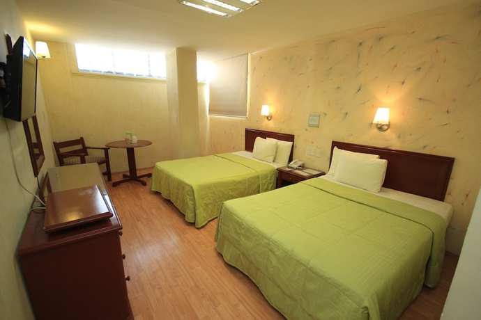 Imagen de la habitación del Hotel Enterprise Inn Plaza. Foto 11