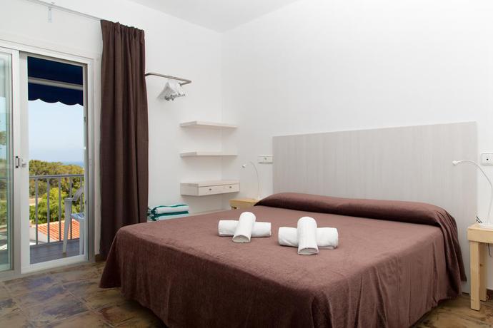 Imagen de la habitación del Hotel Entre Pinos, Es Calo. Foto 2