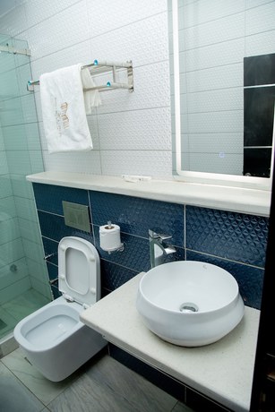 Imagen de la habitación del Hotel Entrust and Suites. Foto 5