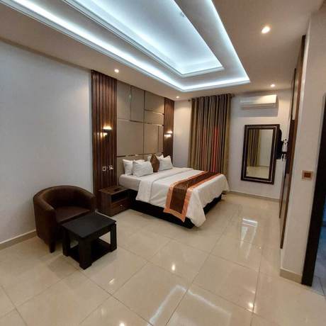 Imagen de la habitación del Hotel Entrust and Suites. Foto 8