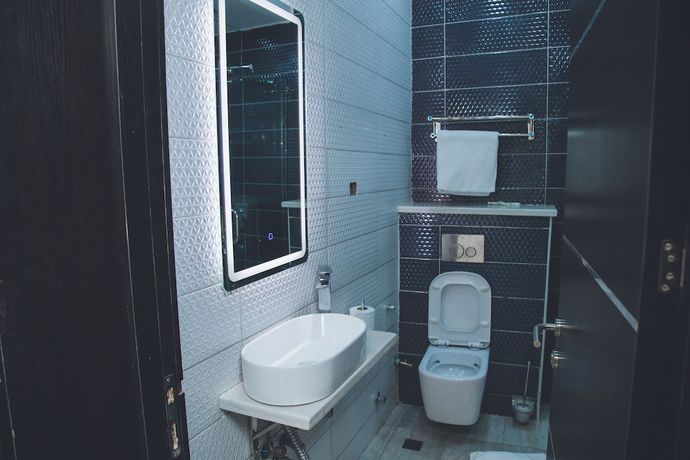 Imagen de la habitación del Hotel Entrust and Suites. Foto 10