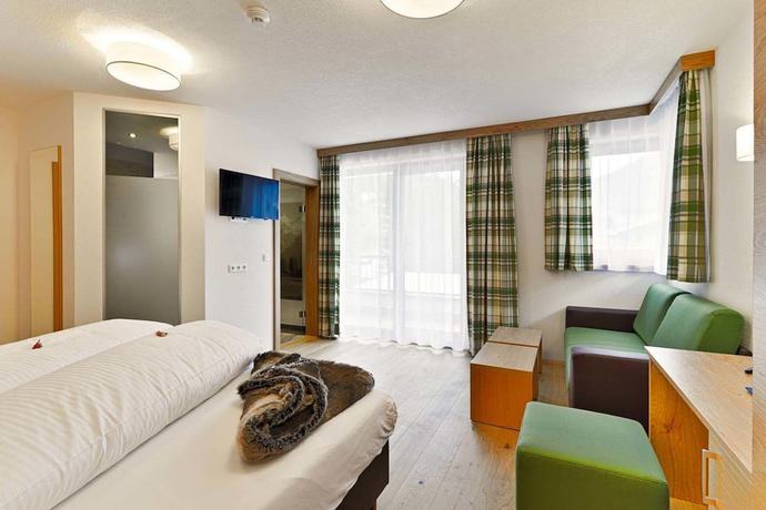 Imagen de la habitación del Hotel Enzian. Foto 8