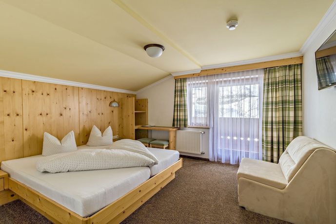 Imagen de la habitación del Hotel Enzian. Foto 14