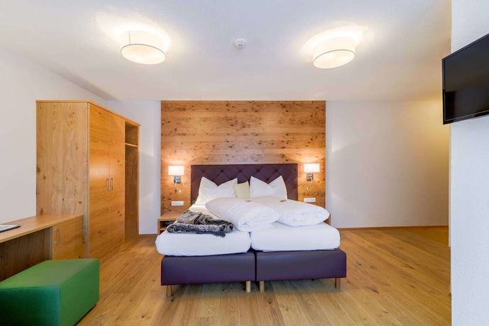 Imagen de la habitación del Hotel Enzian. Foto 16