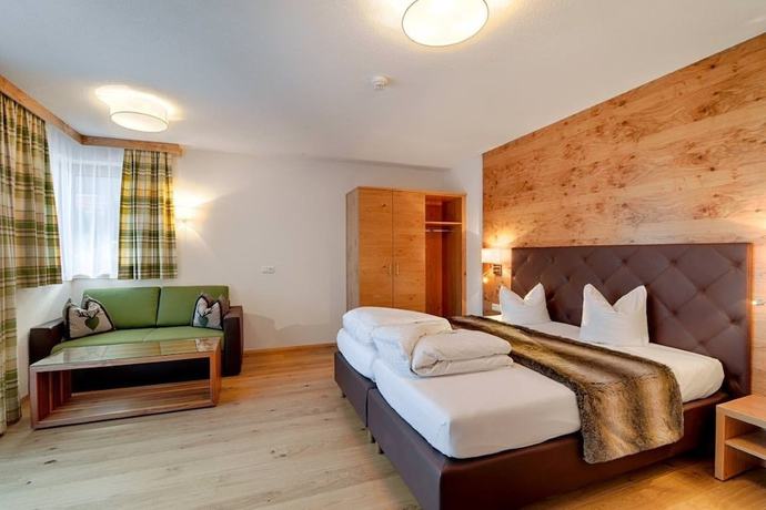 Imagen de la habitación del Hotel Enzian. Foto 18