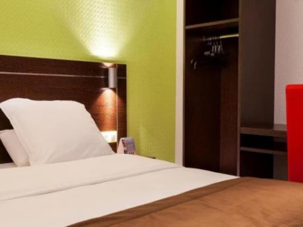 Imagen de la habitación del Hotel Enzo Br&eacute;tigny. Foto 11