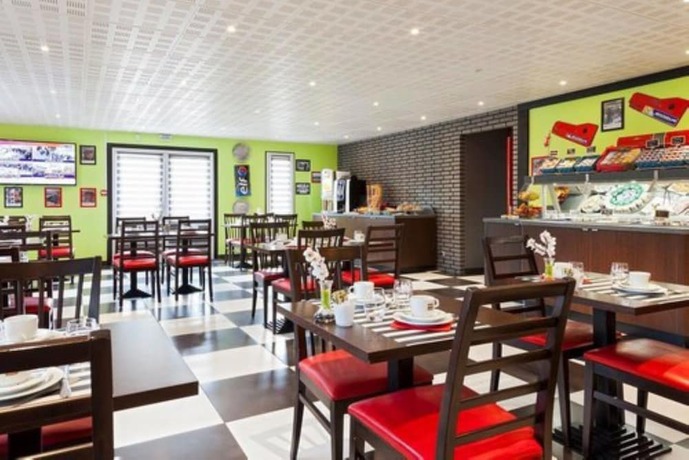 Imagen del bar/restaurante del Hotel Enzo Br&eacute;tigny. Foto 5