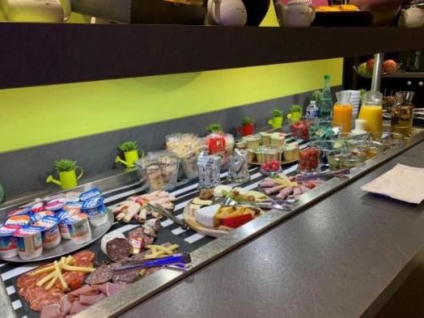 Imagen del bar/restaurante del Hotel Enzo Br&eacute;tigny. Foto 7