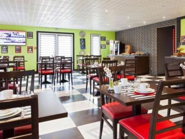 Imagen del bar/restaurante del Hotel Enzo Br&eacute;tigny. Foto 8