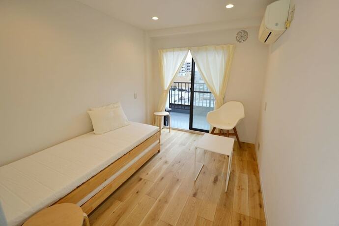 Imagen de la habitación del Hotel Enzo Tokyo. Foto 15