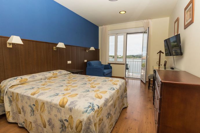 Imagen de la habitación del Hotel Eo. Foto 2