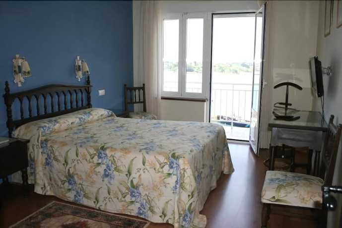 Imagen de la habitación del Hotel Eo. Foto 3