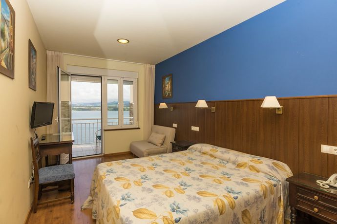 Imagen de la habitación del Hotel Eo. Foto 9