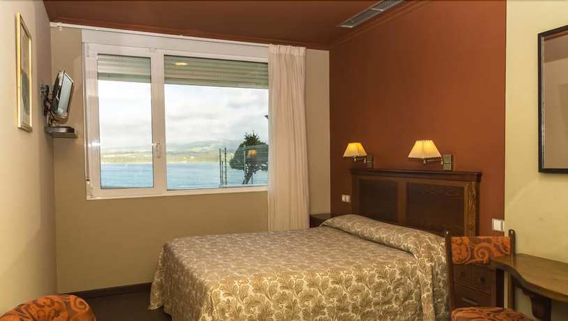 Imagen de la habitación del Hotel Eo. Foto 10