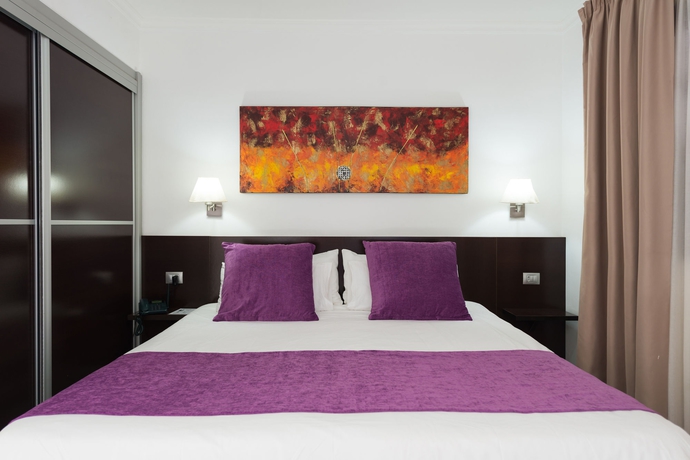 Imagen de la habitación del Hotel Eó Suite Jardin Dorado. Foto 7