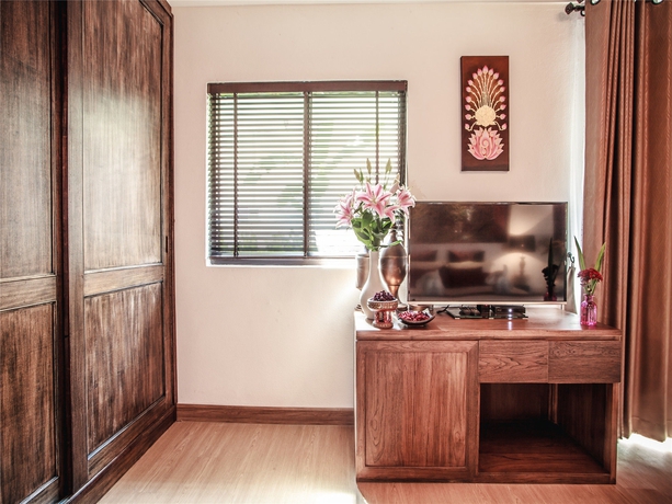 Imagen de la habitación del Hotel E-outfitting Boutique Chaingmai. Foto 2