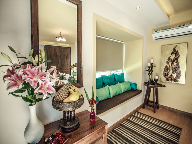Imagen de la habitación del Hotel E-outfitting Boutique Chaingmai. Foto 3