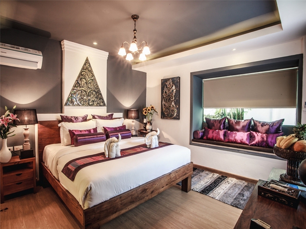 Imagen de la habitación del Hotel E-outfitting Boutique Chaingmai. Foto 4