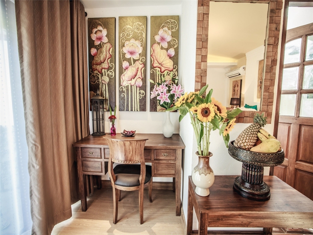 Imagen de la habitación del Hotel E-outfitting Boutique Chaingmai. Foto 6