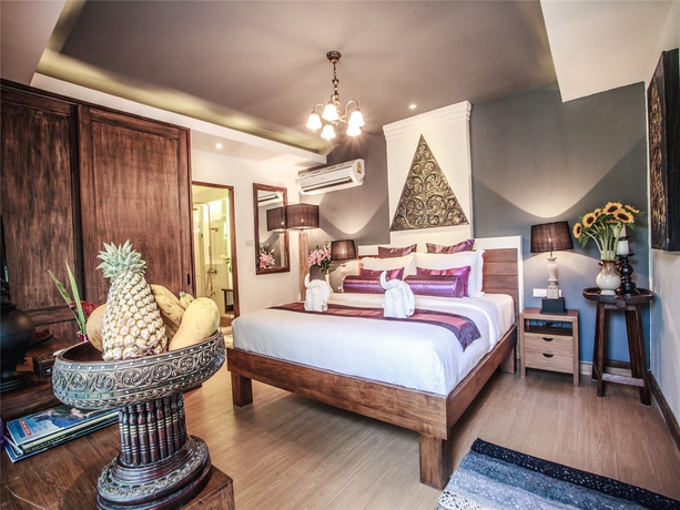 Imagen de la habitación del Hotel E-outfitting Boutique Chaingmai. Foto 7