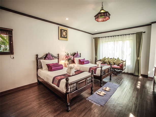 Imagen de la habitación del Hotel E-outfitting Boutique Chaingmai. Foto 11