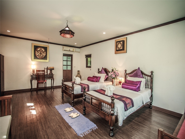 Imagen de la habitación del Hotel E-outfitting Boutique Chaingmai. Foto 14