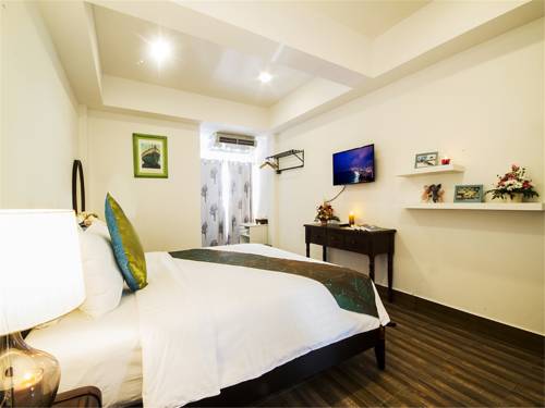 Imagen de la habitación del Hotel E-outfitting Boutique Pattaya. Foto 10