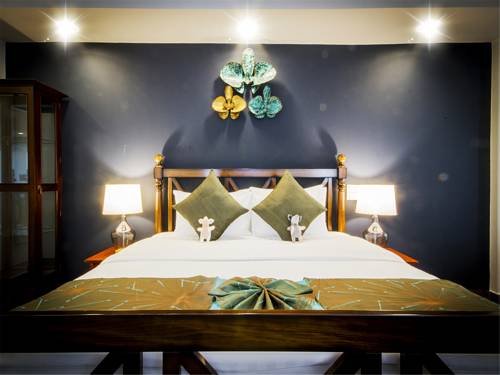 Imagen de la habitación del Hotel E-outfitting Boutique Pattaya. Foto 12