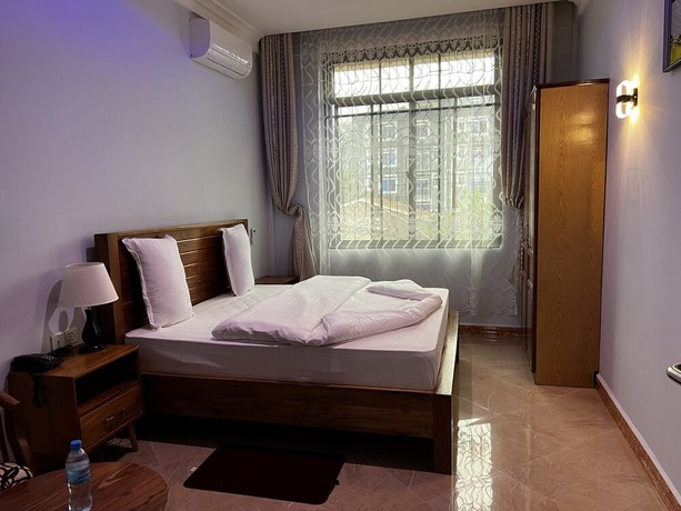 Imagen de la habitación del Hotel Epic Grand Hotel. Foto 2