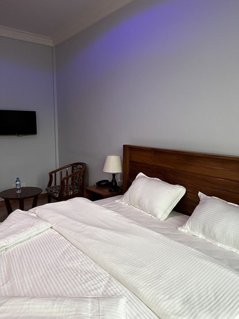Imagen de la habitación del Hotel Epic Grand Hotel. Foto 4