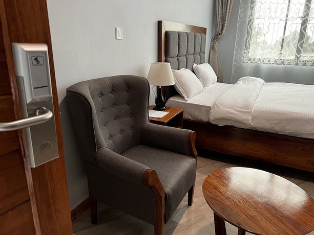 Imagen de la habitación del Hotel Epic Grand Hotel. Foto 10