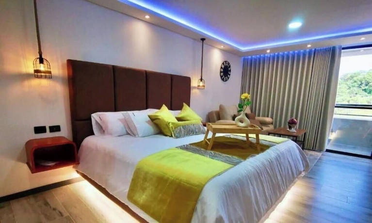 Imagen de la habitación del Hotel Epic Suite 212 Deluxe Aeropuerto. Foto 2