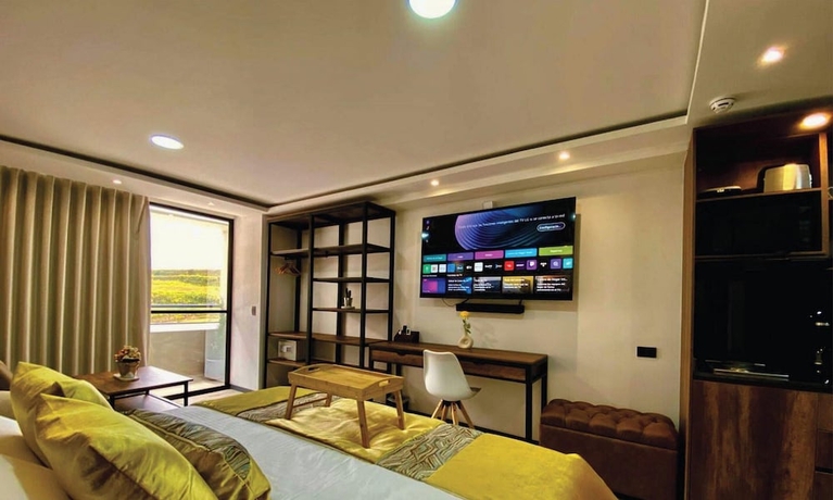 Imagen de la habitación del Hotel Epic Suite 212 Deluxe Aeropuerto. Foto 3