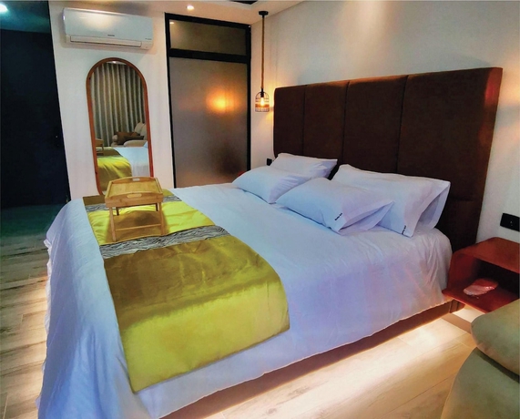 Imagen de la habitación del Hotel Epic Suite 212 Deluxe Aeropuerto. Foto 8