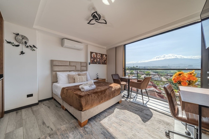 Imagen de la habitación del Hotel Epic Suites x Ahead. Foto 8