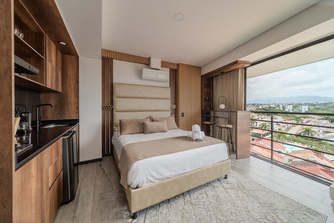 Imagen de la habitación del Hotel Epic Suites x Ahead. Foto 11