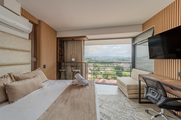 Imagen de la habitación del Hotel Epic Suites x Ahead. Foto 12