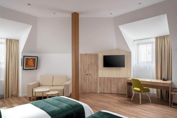 Imagen de la habitación del Hotel Epica. Foto 13