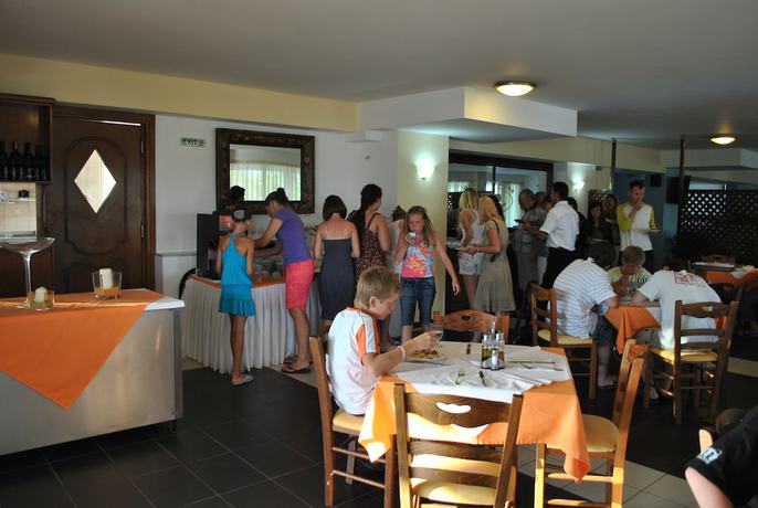 Imagen del bar/restaurante del Hotel Epihotel Odysseas. Foto 4