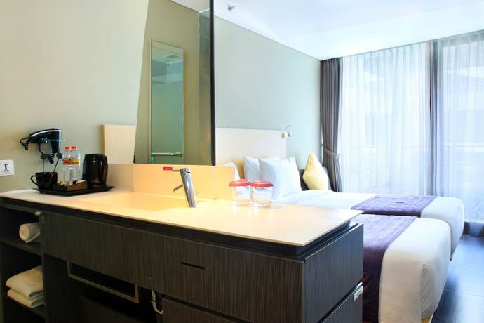 Imagen de la habitación del Hotel Episode Kuta Bali. Foto 2