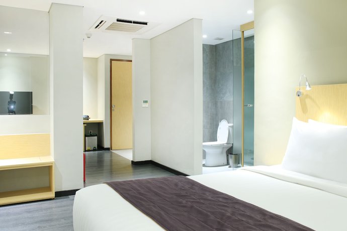 Imagen de la habitación del Hotel Episode Kuta Bali. Foto 5