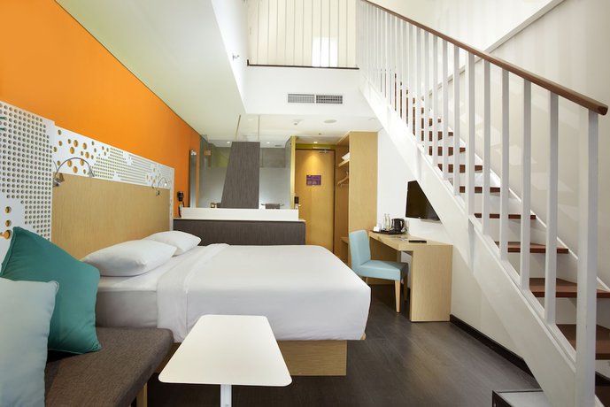 Imagen de la habitación del Hotel Episode Kuta Bali. Foto 8