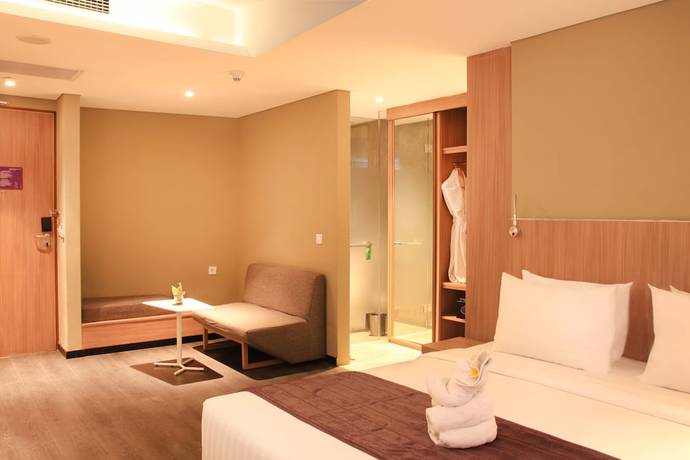 Imagen de la habitación del Hotel Episode Kuta Bali. Foto 10