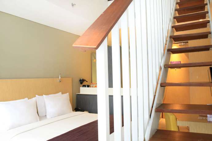 Imagen de la habitación del Hotel Episode Kuta Bali. Foto 13