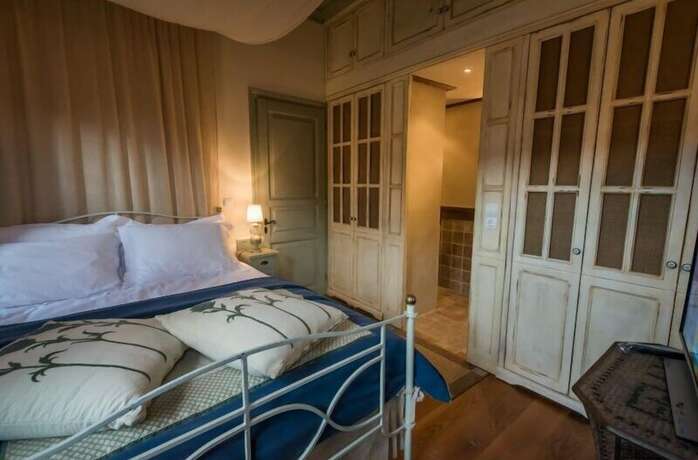 Imagen de la habitación del Hotel Epoches Luxury Suites. Foto 16