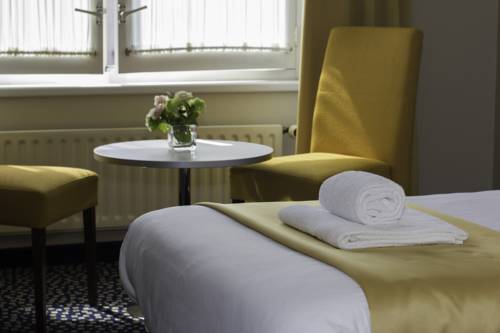 Imagen de la habitación del Hotel Epping. Foto 9