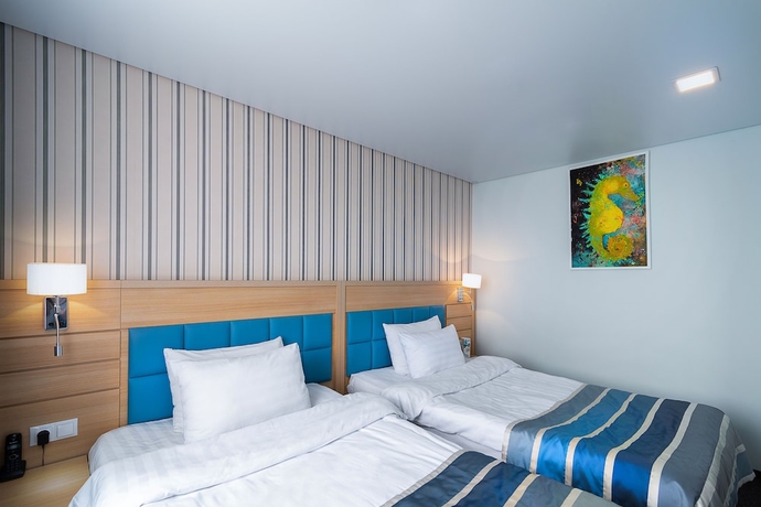 Imagen de la habitación del Hotel Equator, Vladivostok. Foto 11
