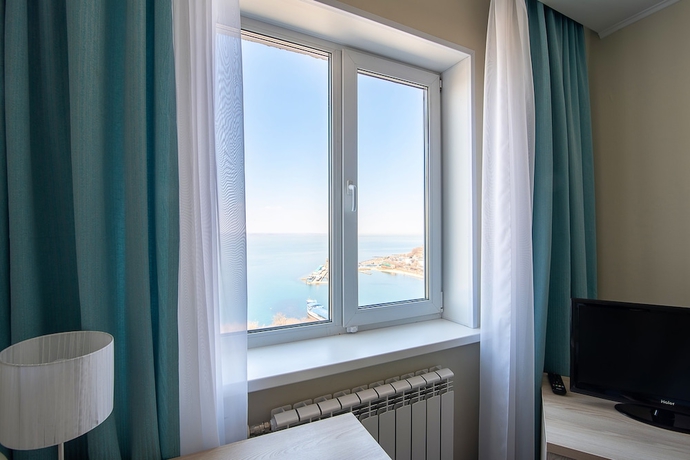 Imagen de la habitación del Hotel Equator, Vladivostok. Foto 14
