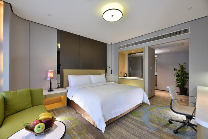 Imagen de la habitación del Hotel Equatorial Shanghai. Foto 5