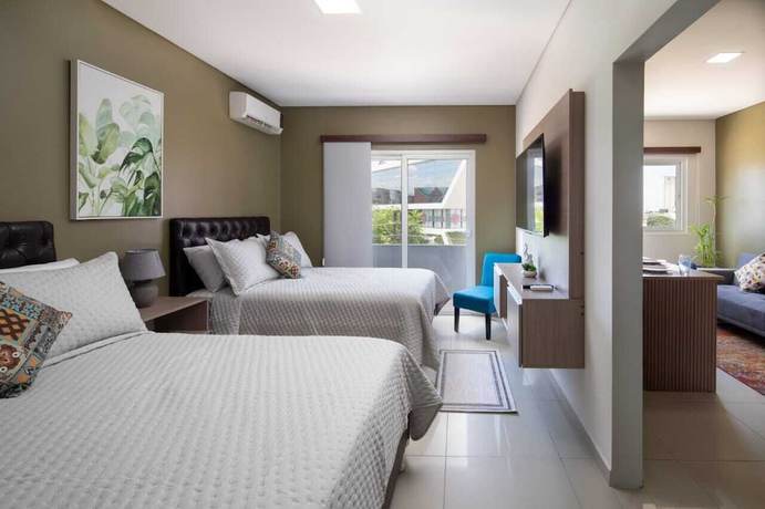 Imagen de la habitación del Hotel Equipetrol Suites Apart. Foto 8